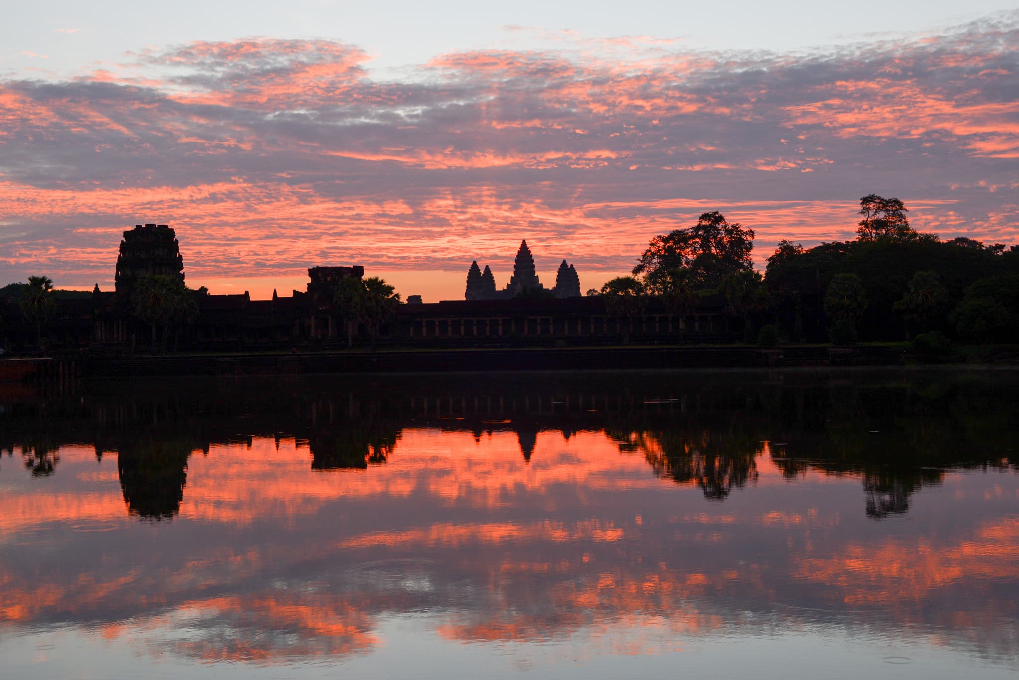 A tranquil image of a peaceful landscape with a sunset